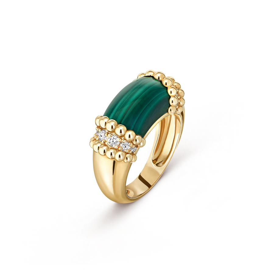 Gold ring with a green gemstone on a transparent background