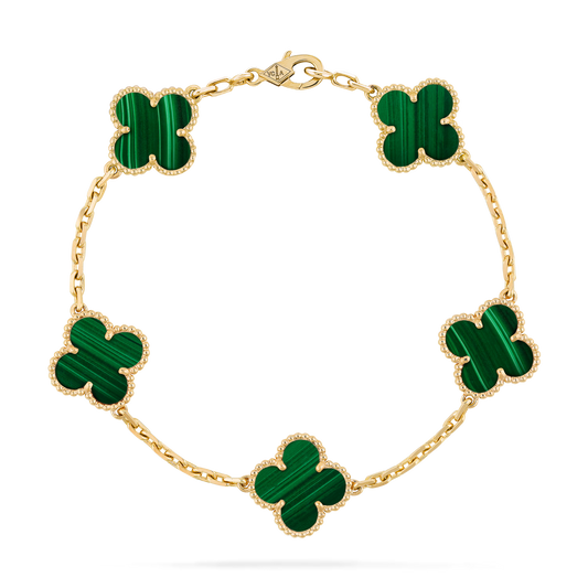 Top-down view of gold clover bracelet featuring five green malachite inlays and beaded trim