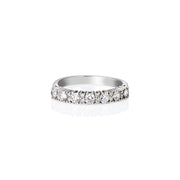 Side view of slim moissanite half eternity ring with round pavé stones, perfect for stacking.