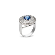 Heirloom-inspired sapphire and moissanite halo ring with split-shoulder band