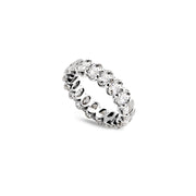 Oval moissanite full eternity band with claw settings, angled view