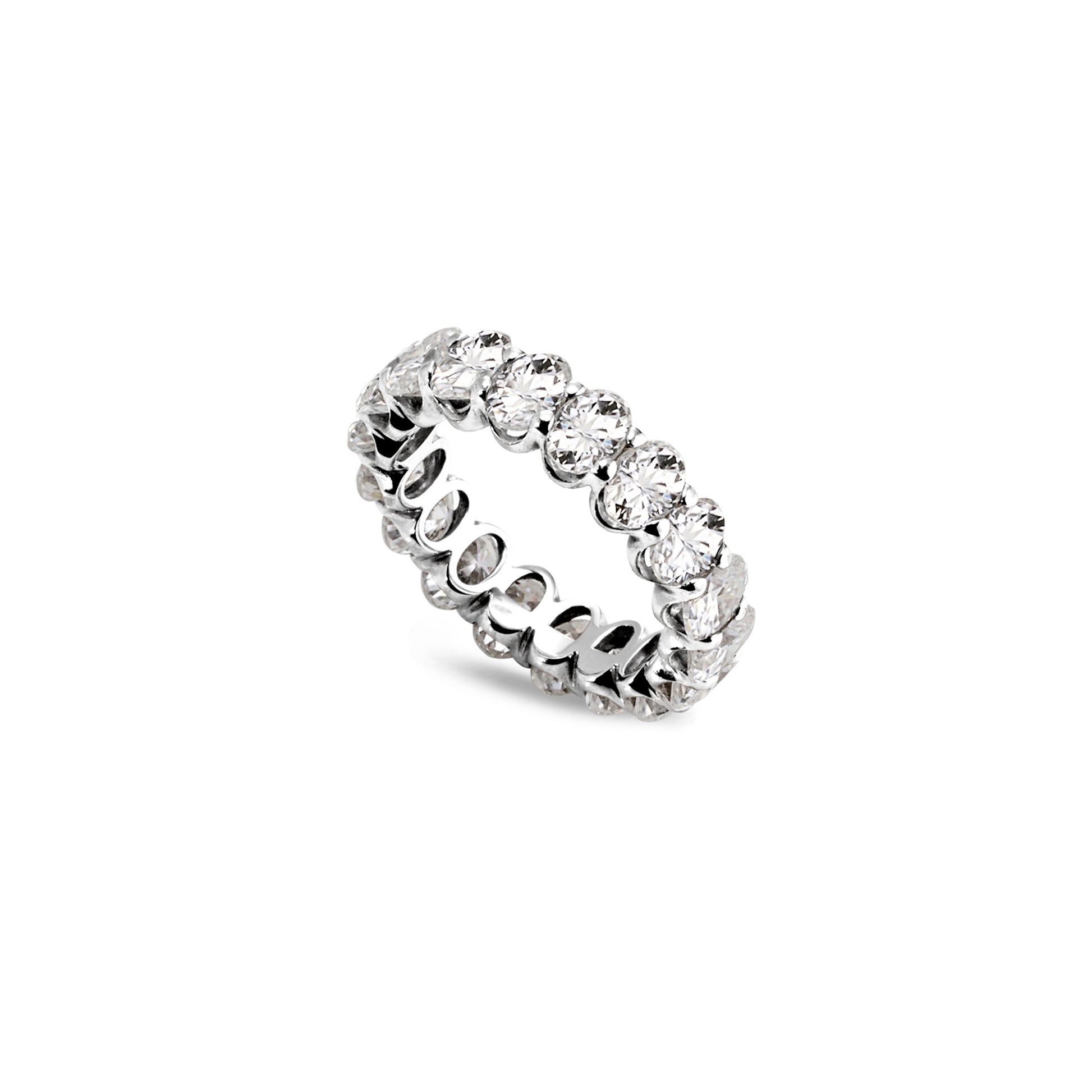 Oval moissanite full eternity band with claw settings, angled view