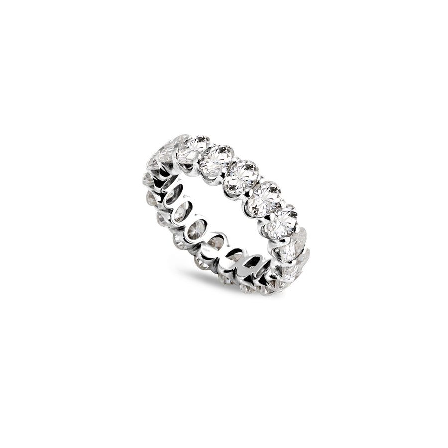 Oval moissanite full eternity band with claw settings, angled view