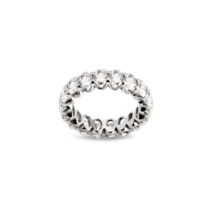 Side view of Nora ring featuring continuous oval-cut moissanite stones in full eternity style