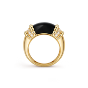 Gold ring with a black gemstone on a transparent background