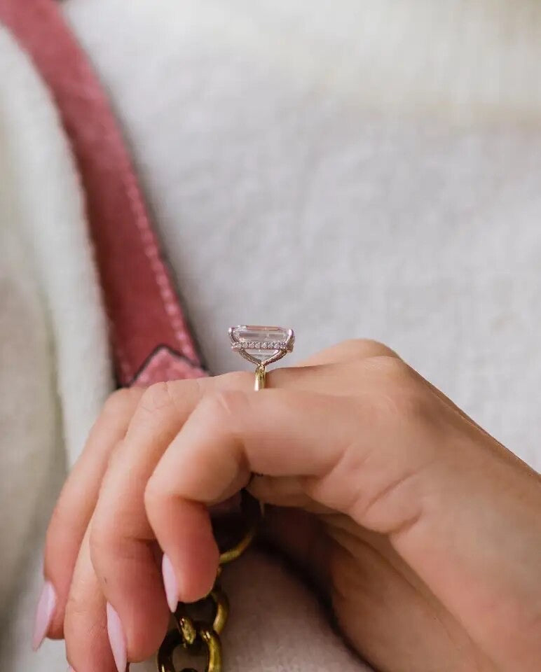 Side angle of Faith ring worn on hand – gold version