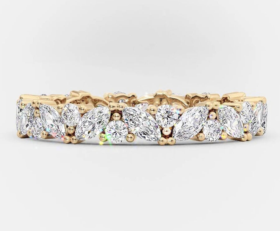 Jackie marquise moissanite eternity ring in yellow gold setting