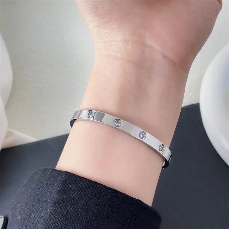 White Gold Forever Bracelet on model's wrist