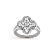 Silver ring with diamond-like stones on a black background