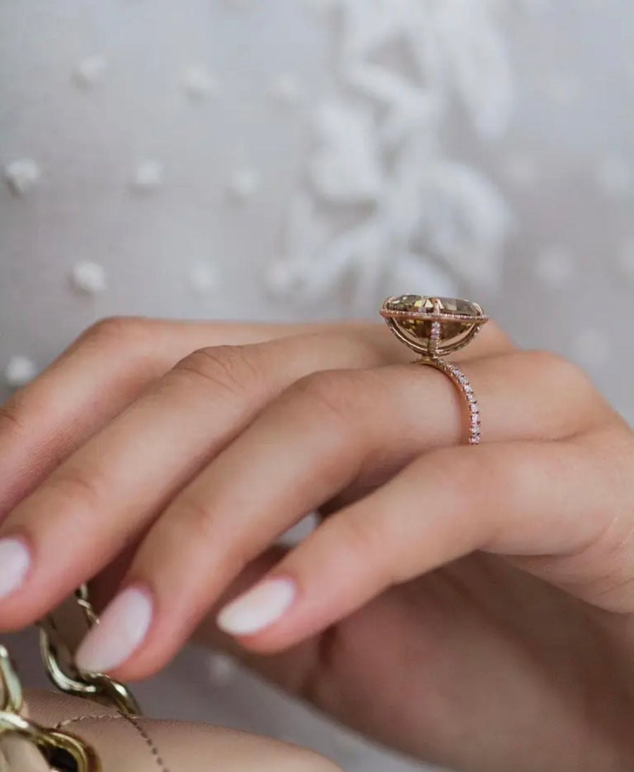 Close-up of 8ct crushed ice moissanite ring in warm champagne hue