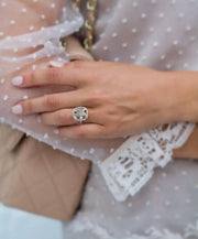 Barcelona ring on hand styled with pearl lace dress