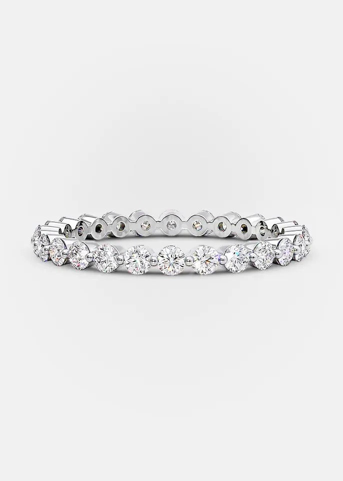 A two-row Moissanite stacking band ring with white gold plating.
