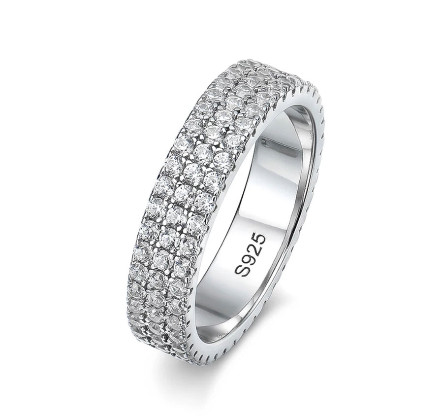 A classic 3 row Moissanite pave band ring with 1.5mm full row Moissanites, set in a solid 925 silver, plated in 18k white gold.