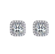 A pair of round cut Moissanite earrings set in 925 sterling silver, with the main earring featuring a cushion halo design.