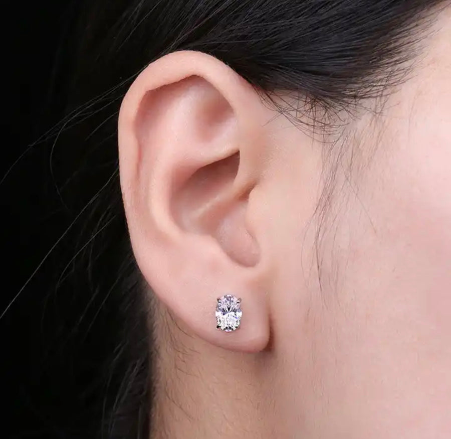 Woman wearing Molly Moissanite earrings