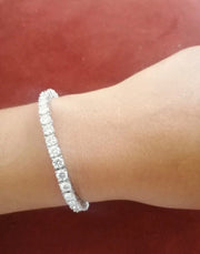 Close-up of Soho 4mm Moissanite Tennis Bracelet on wrist – 925 silver with white gold plating